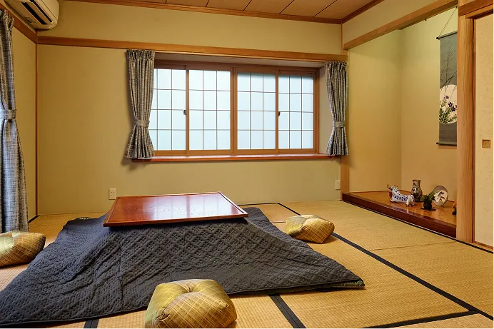 Tatami room with a low table and floor cushions