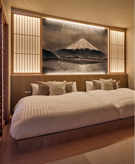 Japanese-modern bedroom with a painting of Mt. Fuji