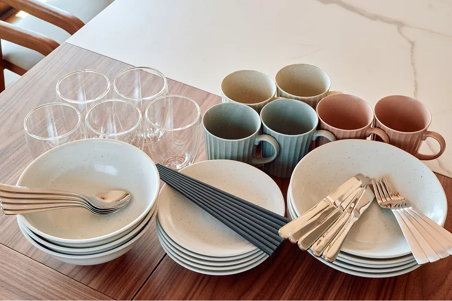 Tableware, glasses, mugs, and cutlery for all guests