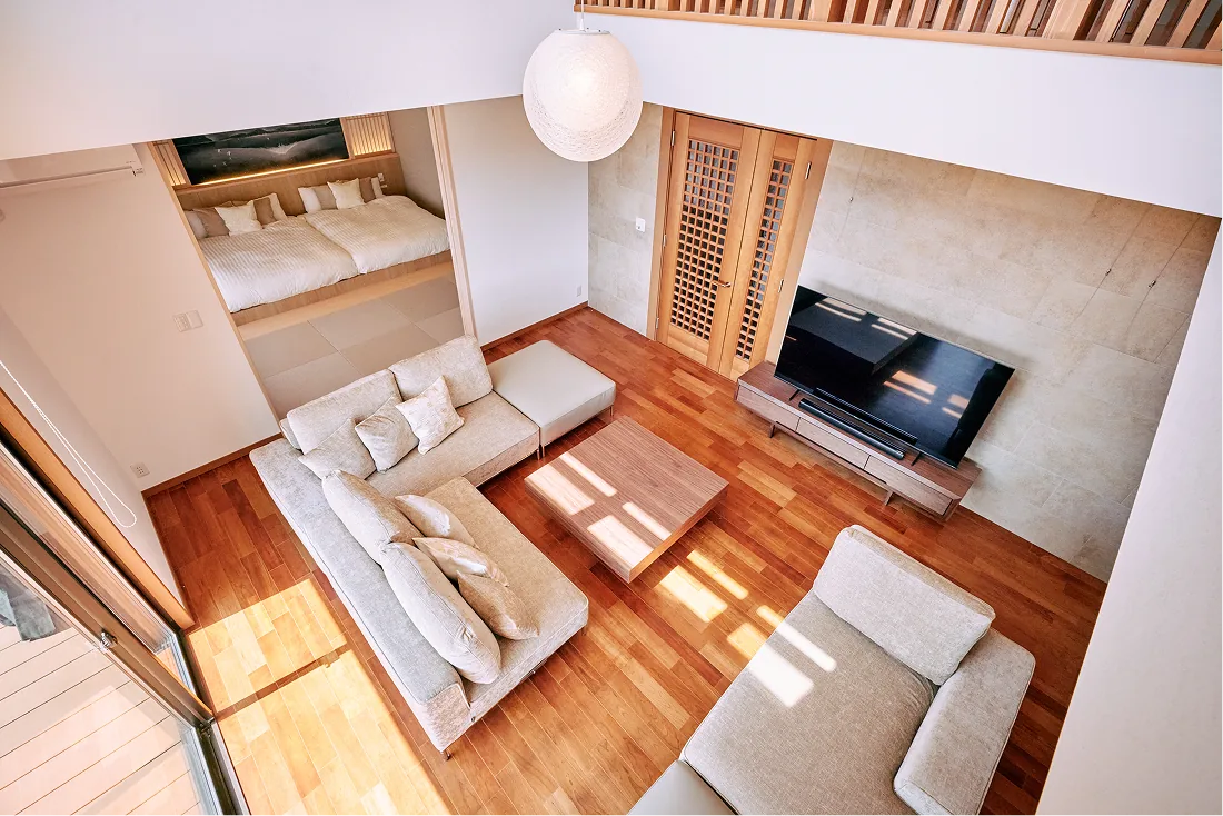Double-height living room seen from the second floor