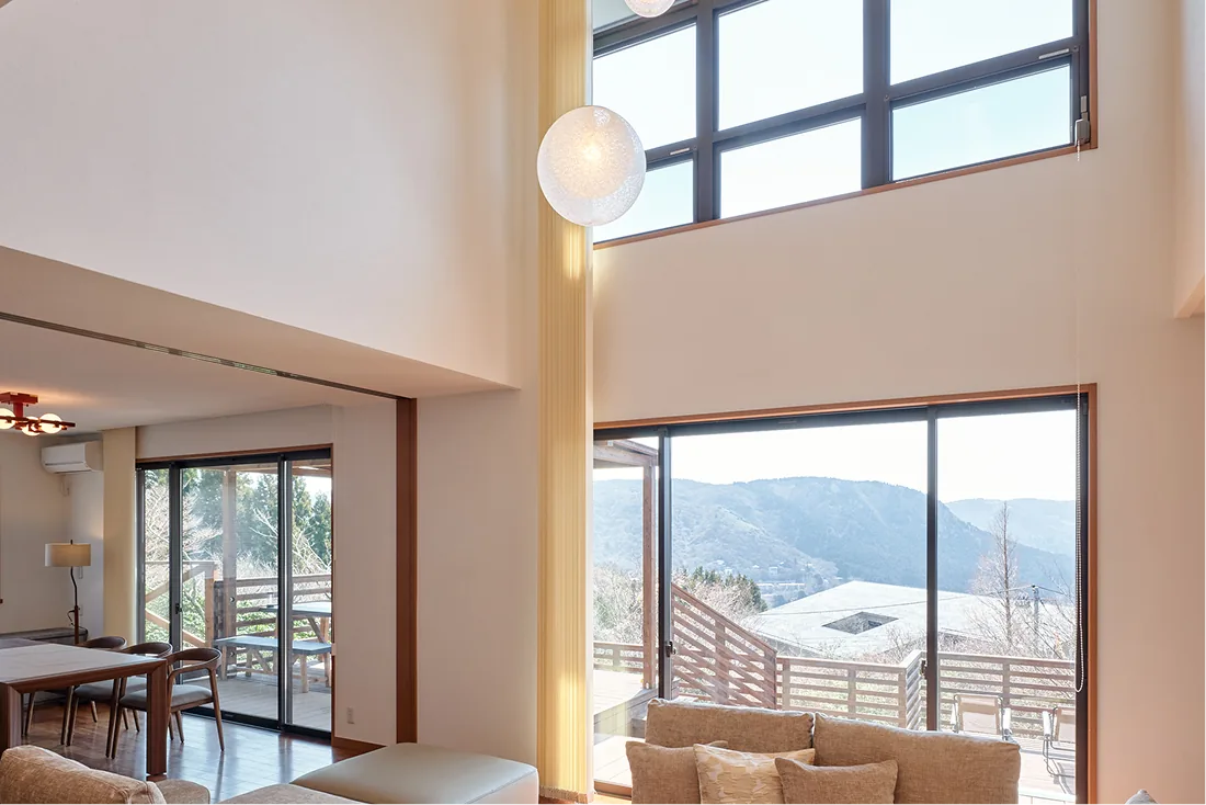 High windows of the atrium and spherical pendant lights